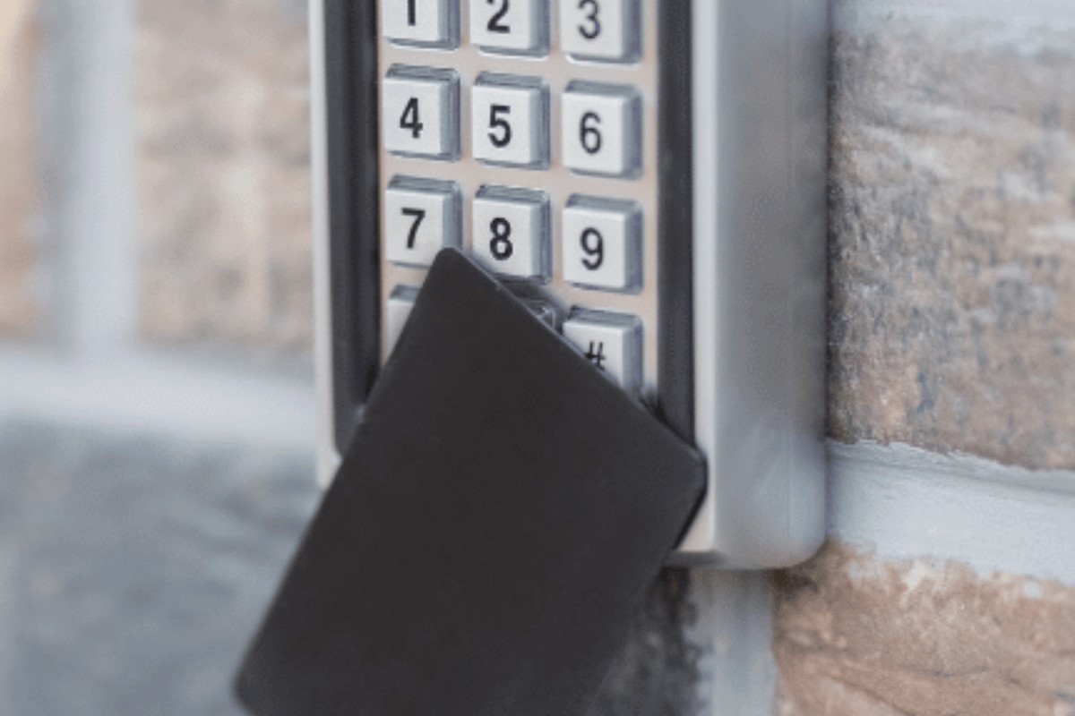 Hotel staff managing digital door access control system