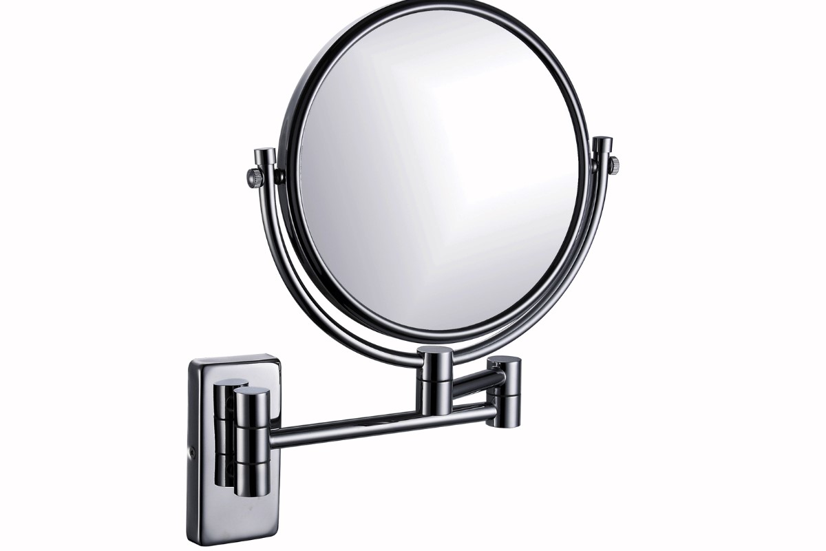 LED lighted shaving and makeup mirror in luxury hotel bathroom