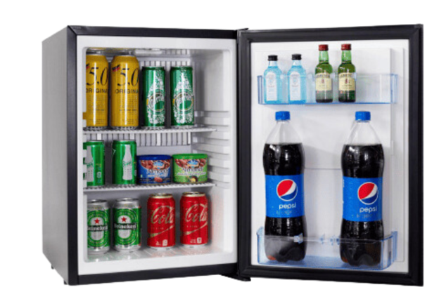 Silent hotel minibar refrigerator installed in luxury hotel room cabinetry